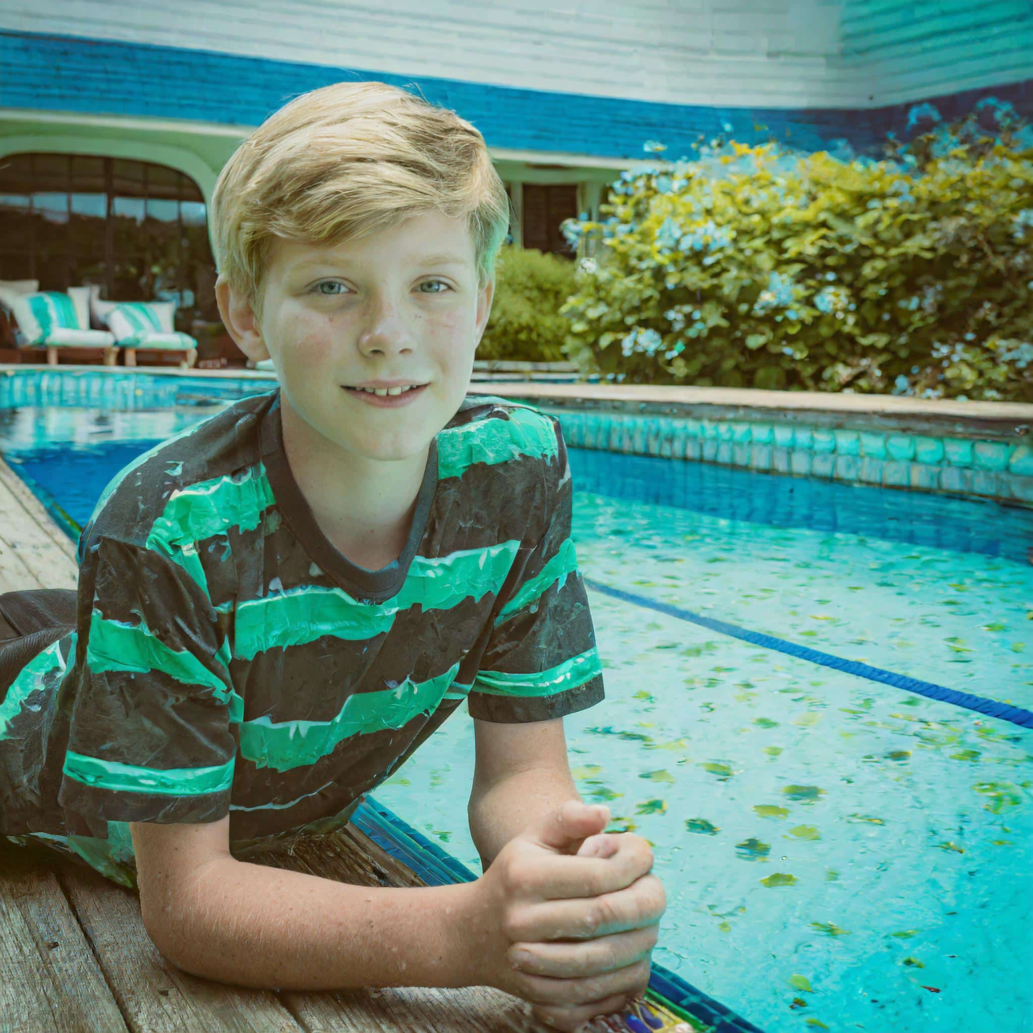 Poolside, inhaling the subtle scent of chlorine after a long day of swimming.