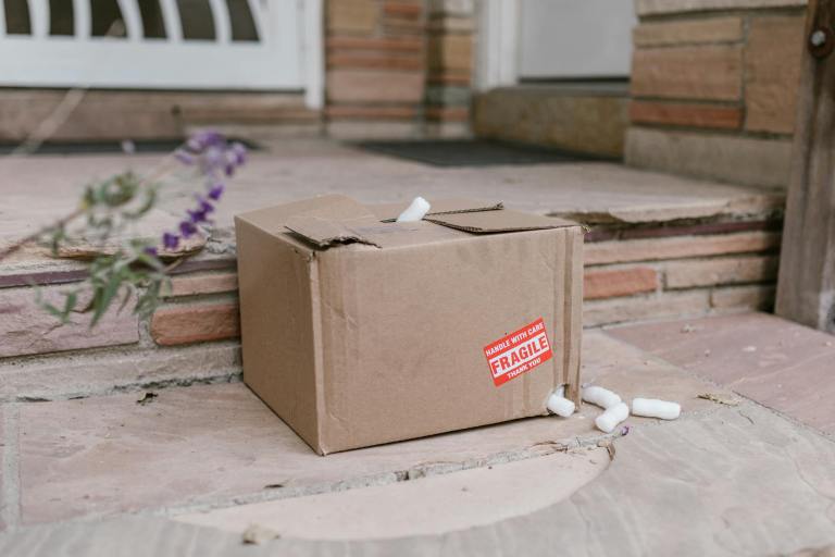 a cardboard box with a hole
